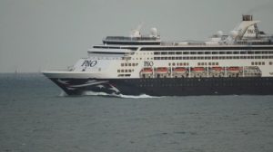 P&O's Pacific Aria viewed at night from the balcony of Capeview Apartments